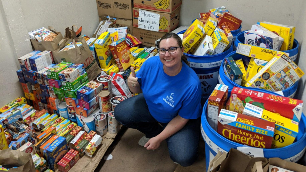 Volunteer with Piles of Cereal