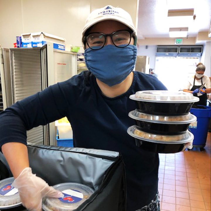 Volunteer packing food