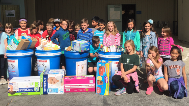 Group of kids with Donations